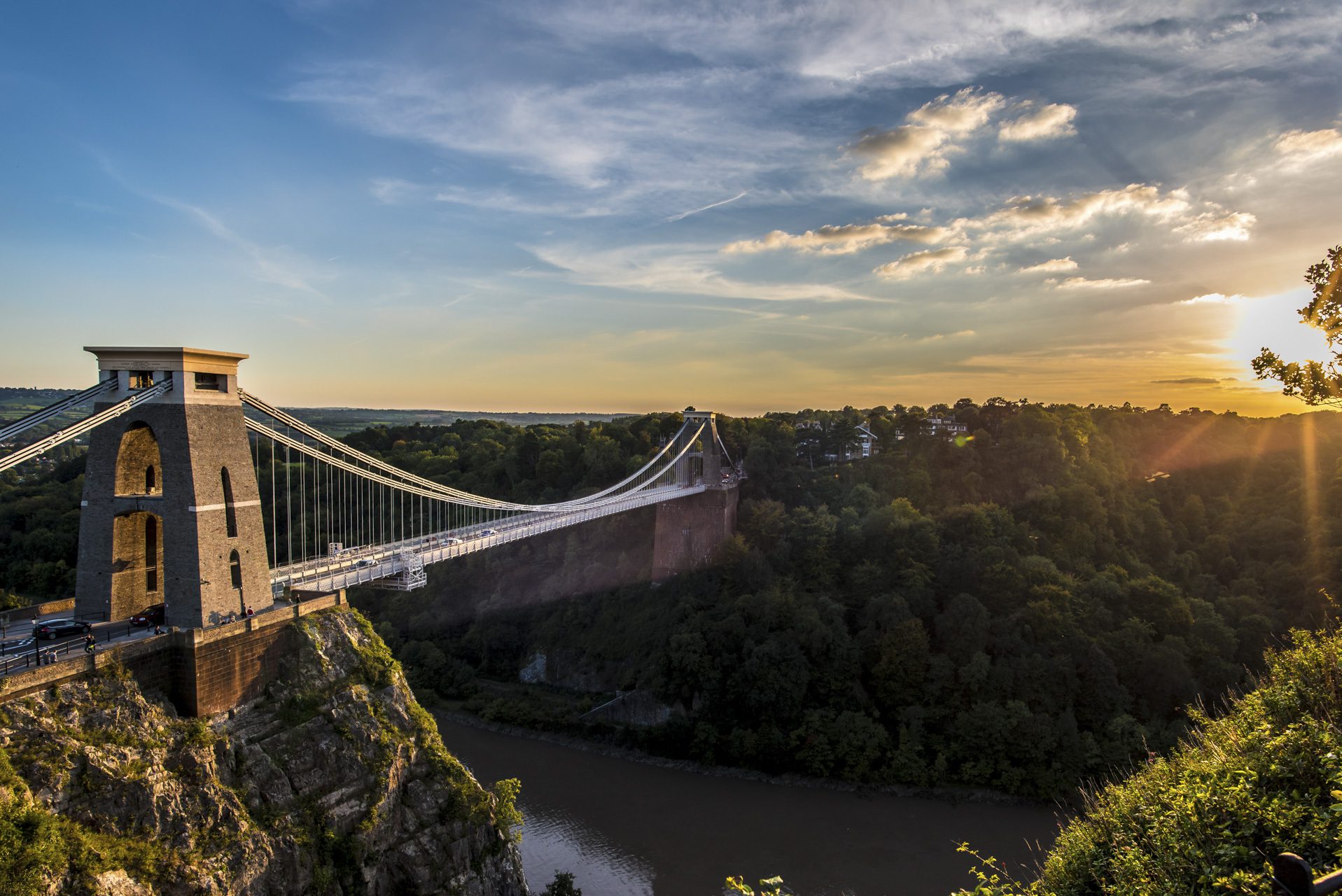 Clifton Suspension Bridge, Bristol, UK with sunset and sunbeams