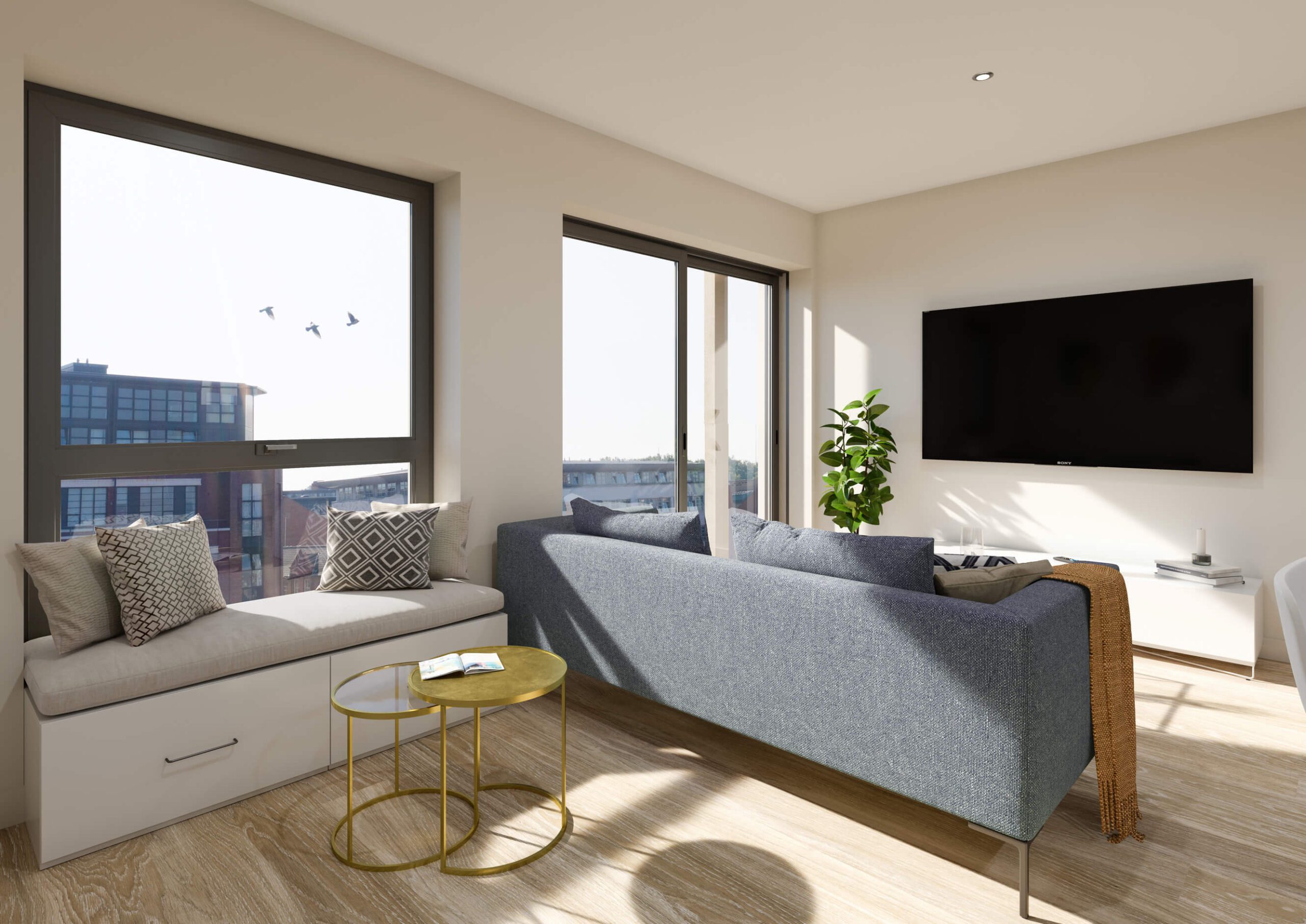 Living room interior in Birmingham development East and Green showing large windows and stylish furnishings