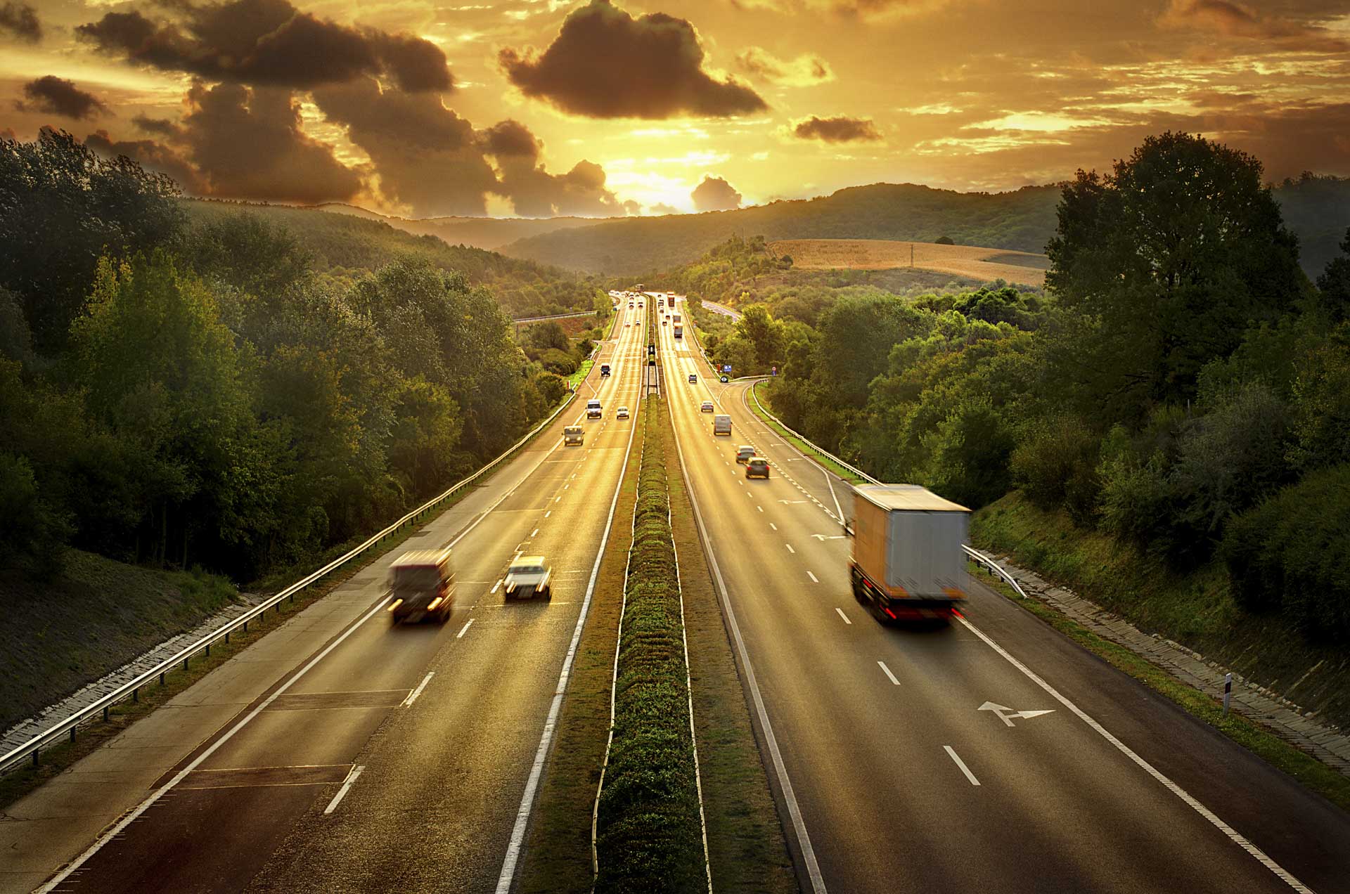 Highway traffic in sunset