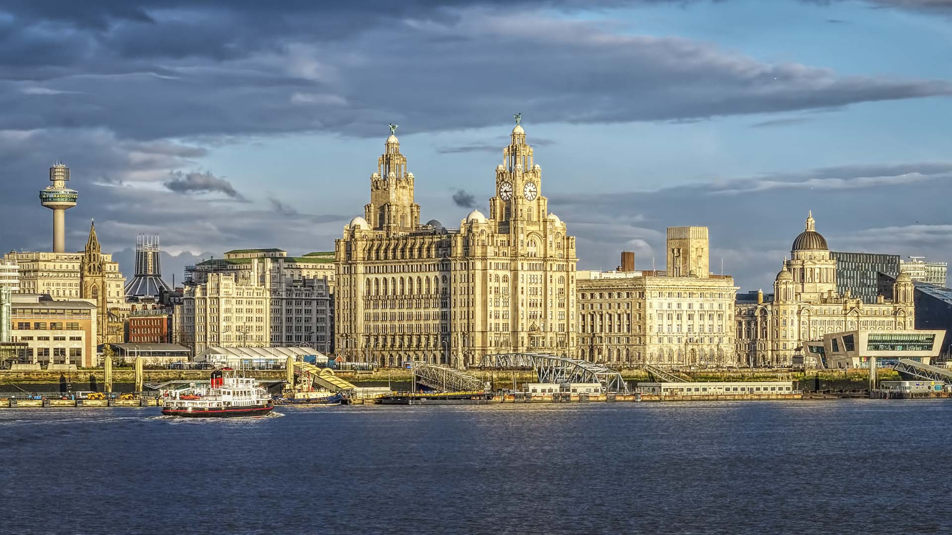 Scenic view of Liverpool waterfront and skyline showing the Three Graces representing North West property