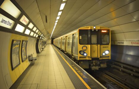 James Street underground station in Liverpool, UK where a train waits on the platform