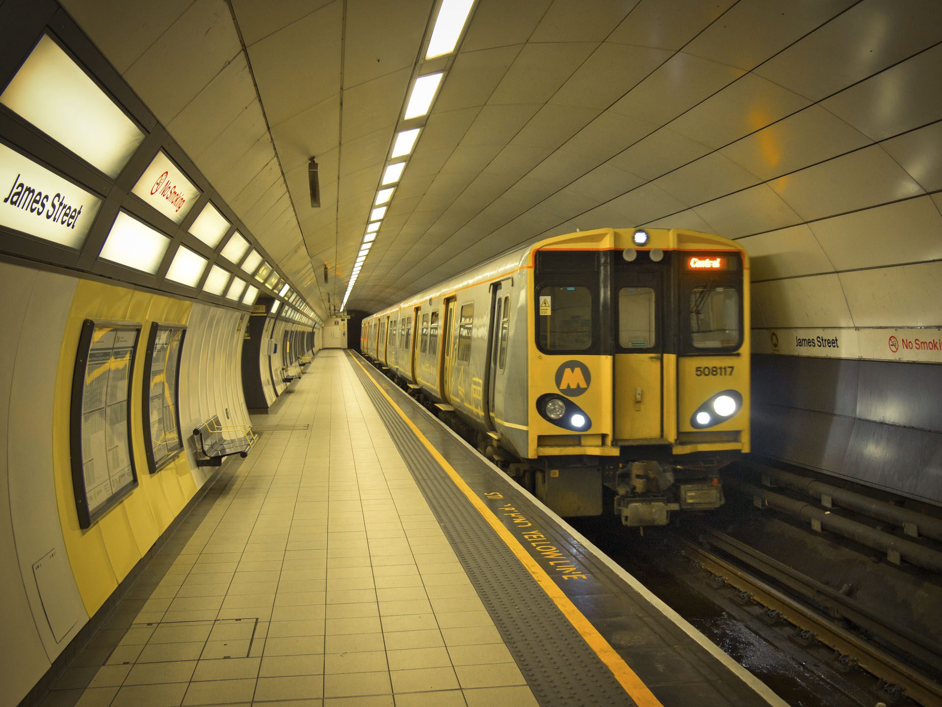 James Street underground station in Liverpool, UK where a train waits on the platform