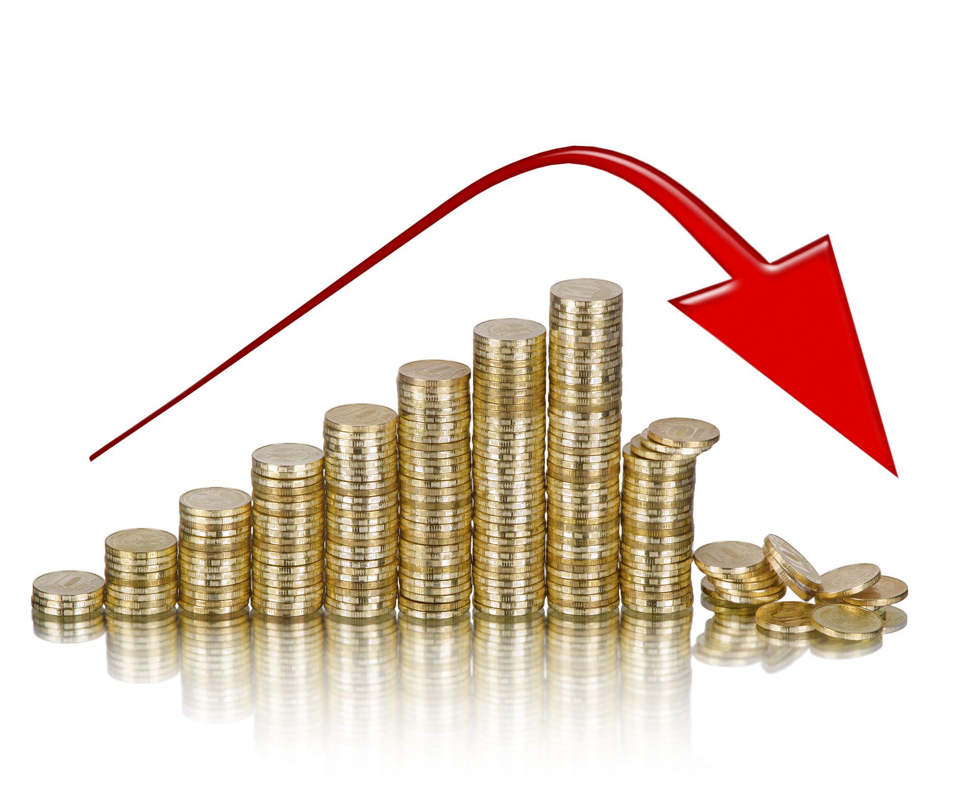 Stacked gold coins and red arrow pointing down representing falling GBP for international property investors