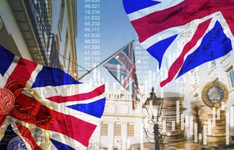Great Britain flag, stock market graphic background on financial market trade chart