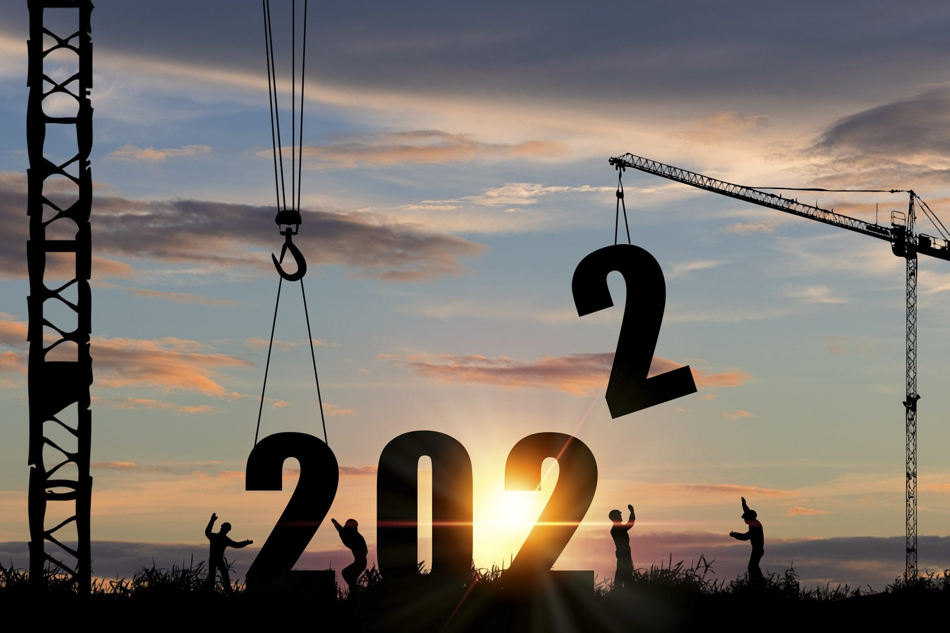 Construction workers with cranes arranging numbers 2022 to represent the new year off-plan property market