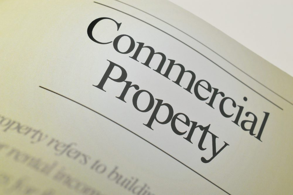 Text 'commercial property' on a paper