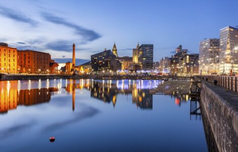 Evening view of Liverpool Albert Dock and waterfront new-build property, a popular investment spot
