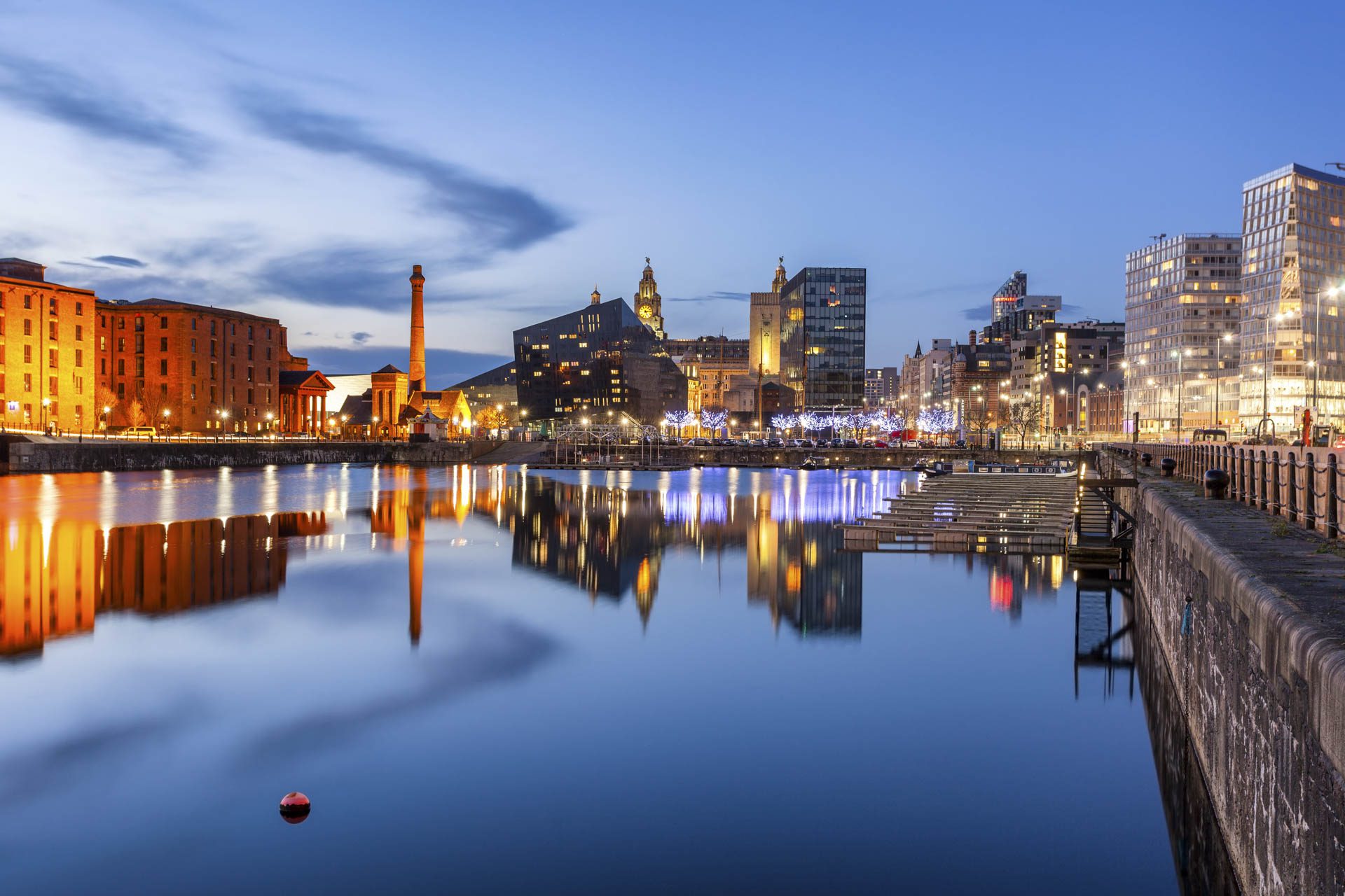 Evening view of Liverpool Albert Dock and waterfront new-build property, a popular investment spot