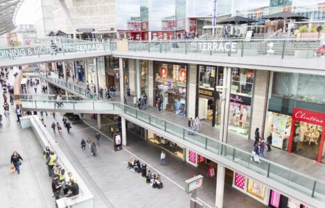 LIVERPOOL, ENGLAND - APRIL 3, 2017: People walking in the Liverpool One shopping centre. The place is the largest open air shopping centre in the United Kingdom and the 5th largest overall.