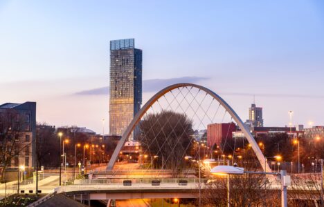 Evening dock view in Manchester with new-build property in the background