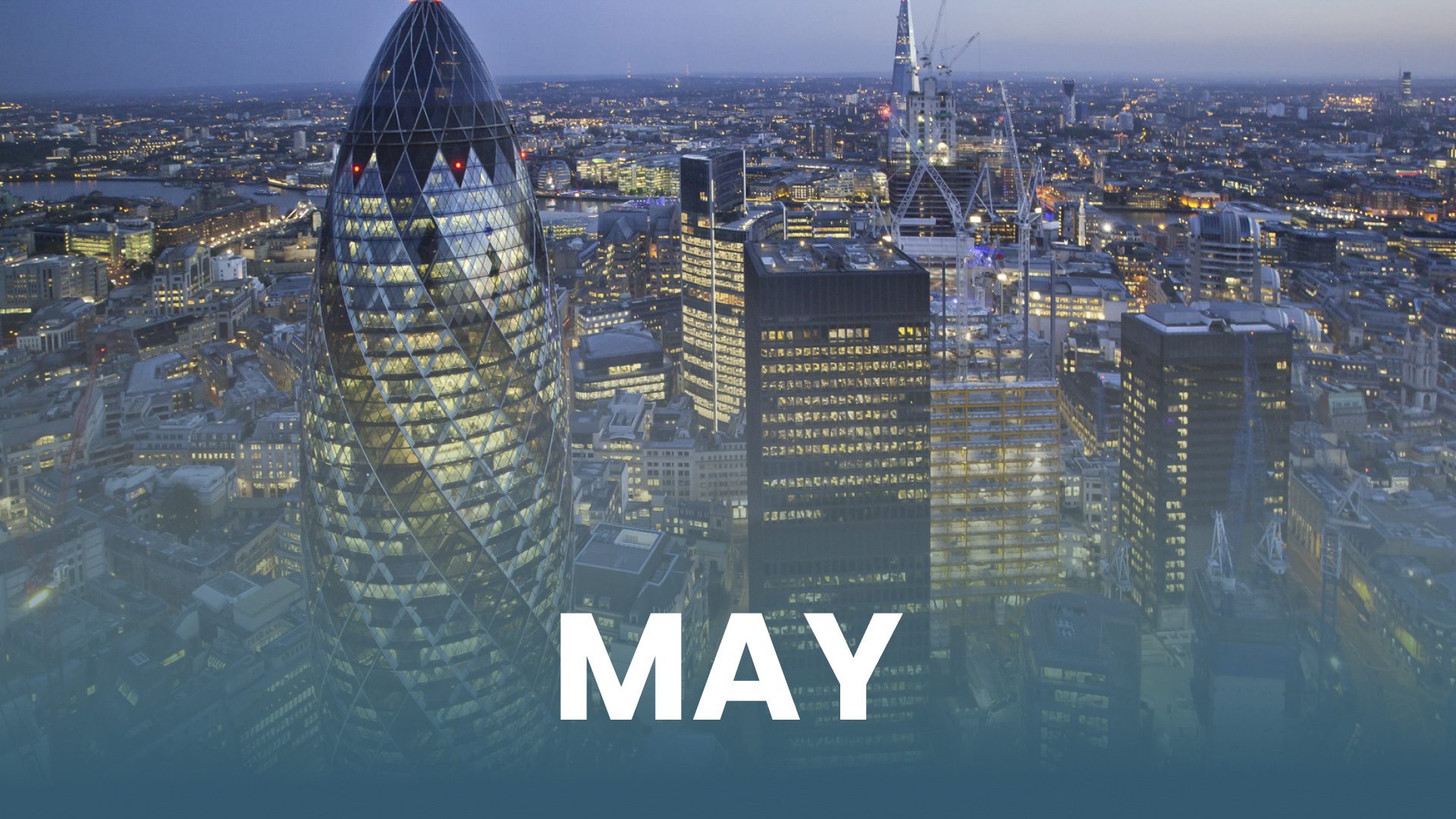 May text over city aerial view