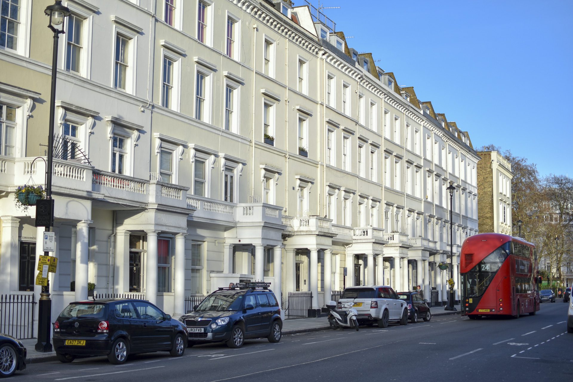 Traditional London white townhouses in Pimlico representing the property market