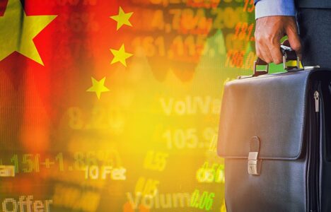 Chinese investor holding a bag