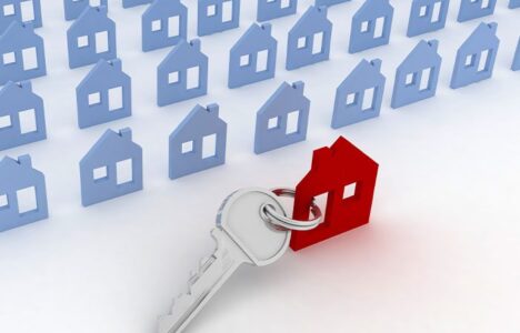 A key with property house-shaped key chain