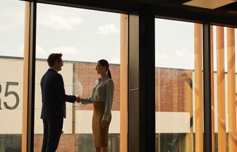 Two-people-shaking-hands-investor-landlord