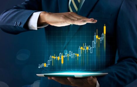 Man holding his hand above a hologram