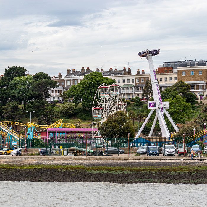 Southend-on-Sea, Essex / UK - JUN 02 2019: colourfulattractions at the beach between buildings