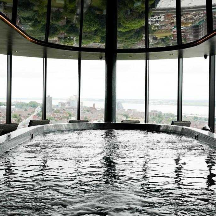 A luxurious rooftop infinity pool at Parliament Square with stunning panoramic views of Liverpool's skyline.
