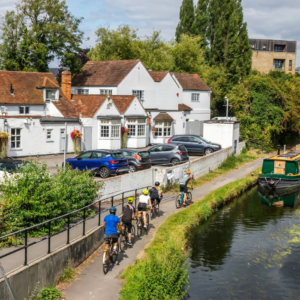 Uxbridge canal in London with houses and greenery beside it