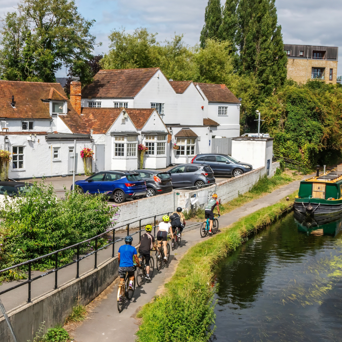 Uxbridge canal in London with houses and greenery beside it