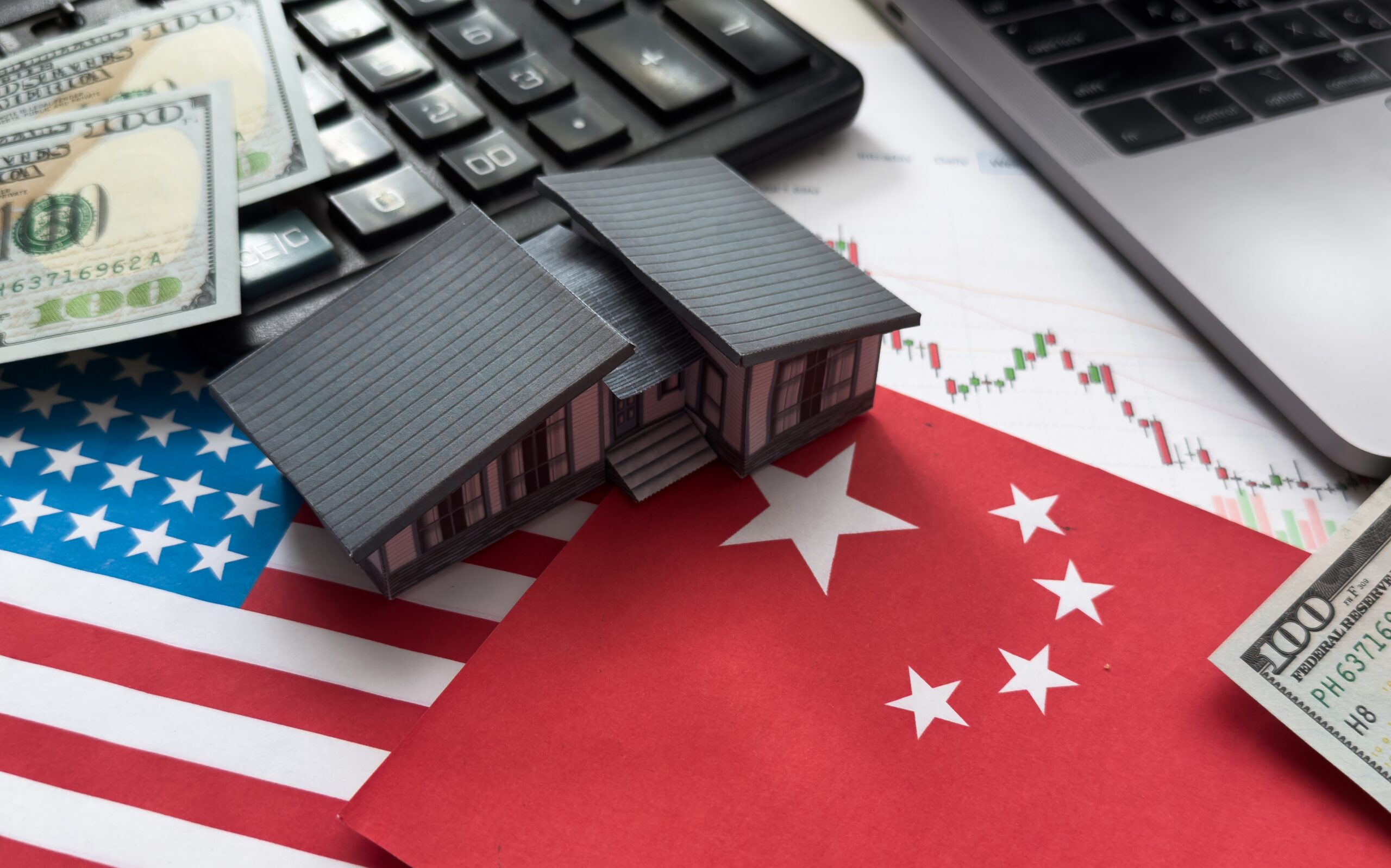 Trumo Trade War - US and China flag with house figure and calculator