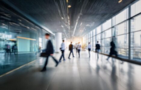 Blurred image of business people walking