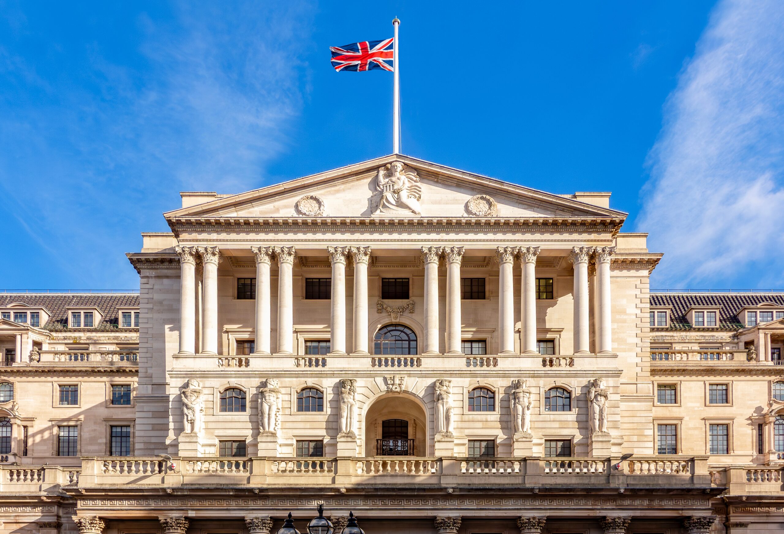 Bank of England building in London, with blue skies