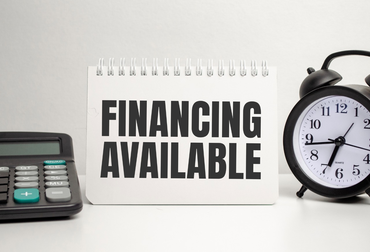 word financing available is printed on the sheet next to a calculator