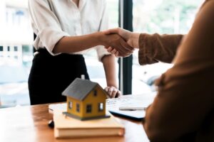 tenant shaking hands with landlord