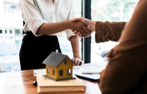 tenant shaking hands with landlord