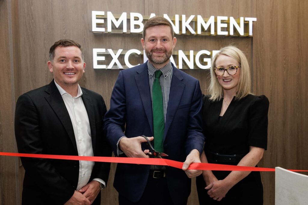 Legacie celebrates the grand opening of Embankment Exchange, cutting ribbon