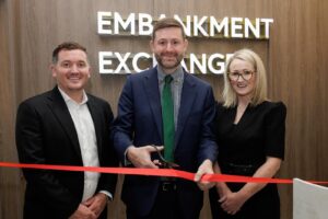 Legacie celebrates the grand opening of Embankment Exchange, cutting ribbon