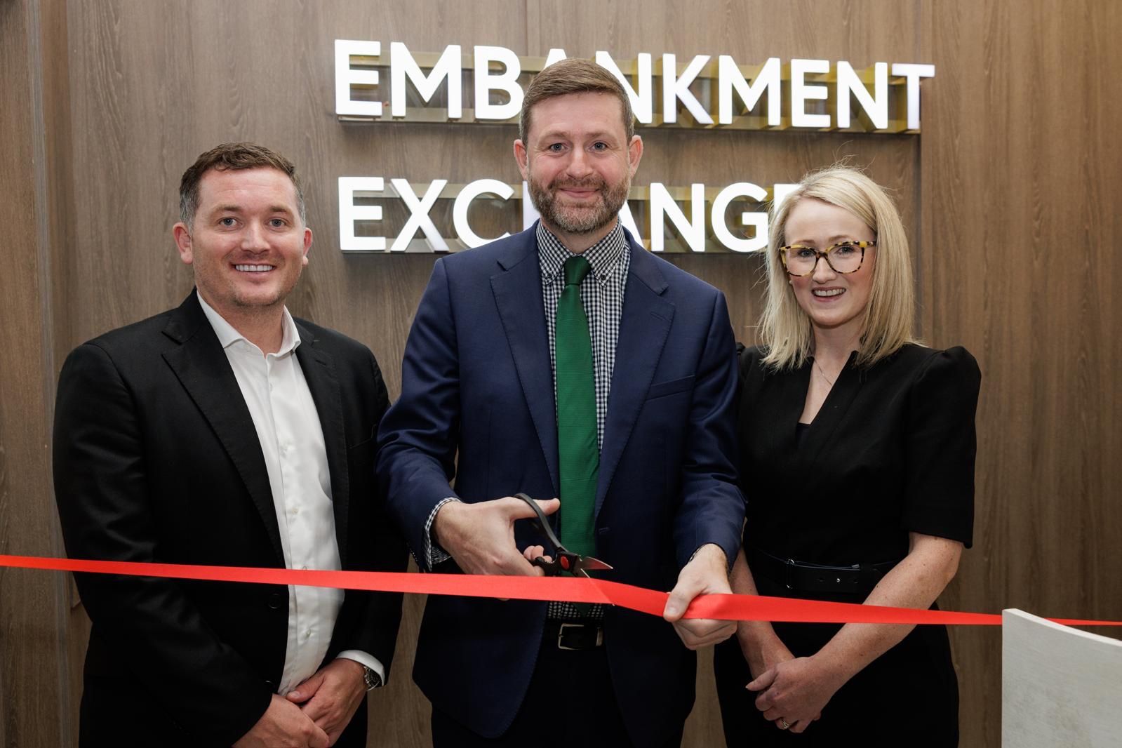 Legacie celebrates the grand opening of Embankment Exchange, cutting ribbon