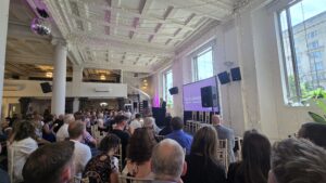Liverpool Developers Forum 2025 - photo of crowd of people sitting and presenter