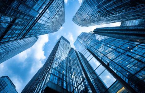 Skyscrapers in a city centre with bright blue skies