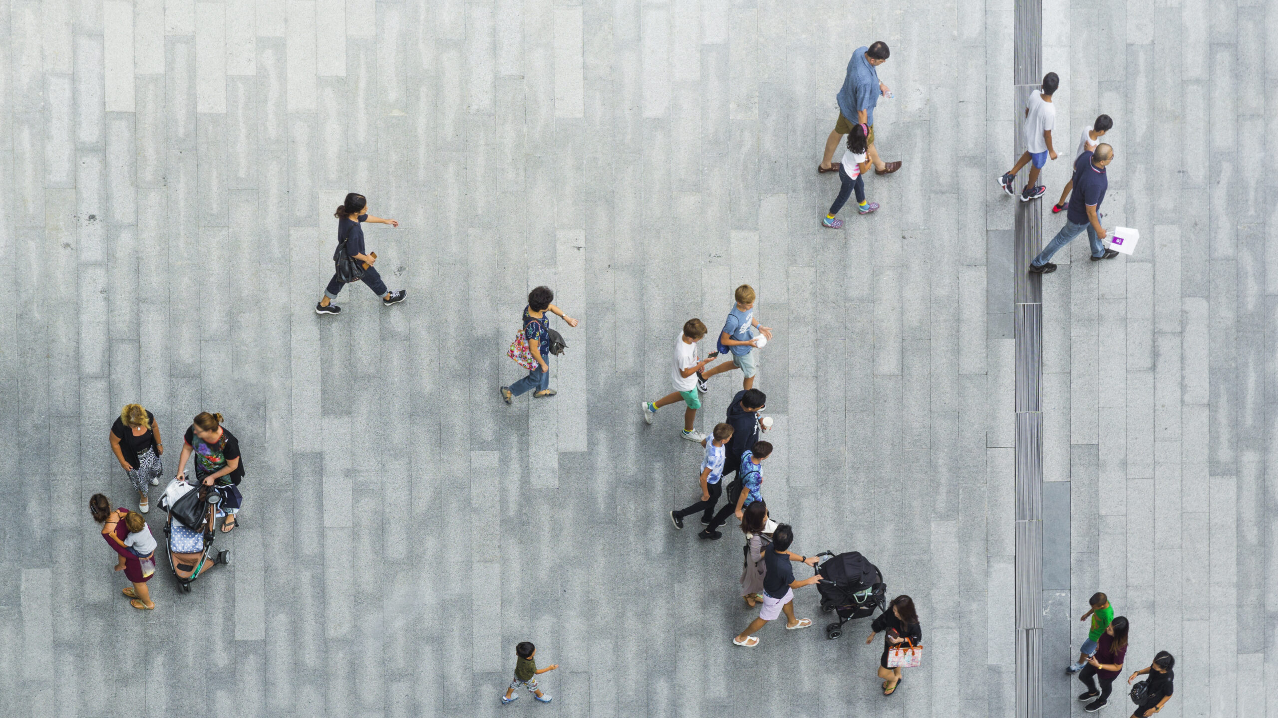 Stock image of people walking at a business park