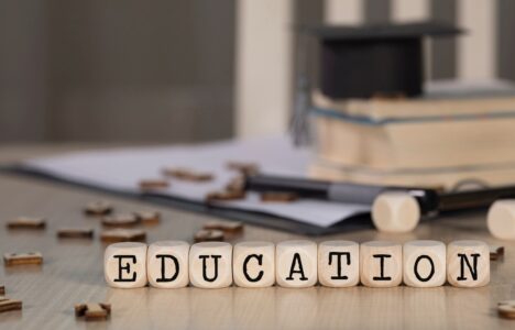 Word EDUCATION composed of wooden dices