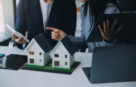 real estate broker agent presenting to a client