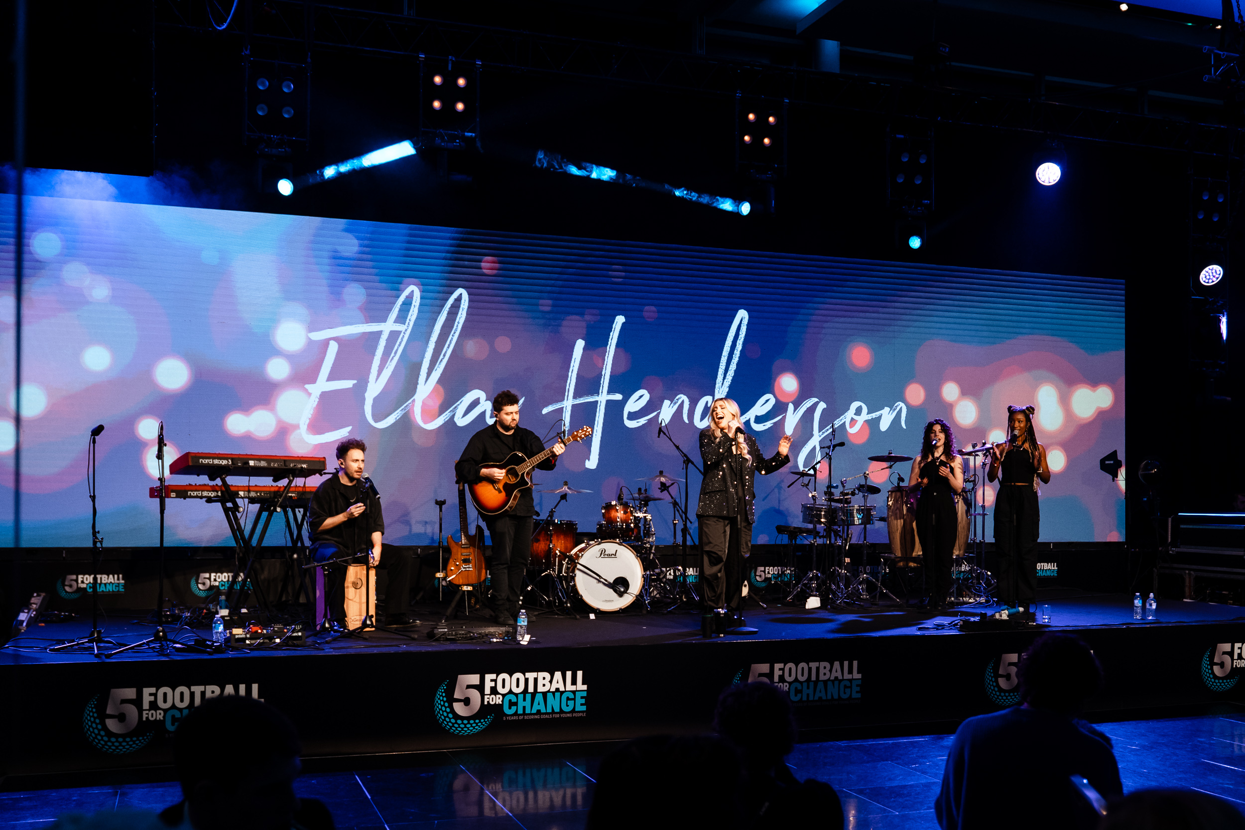 Ella Henderson performing at Football For Change 2025